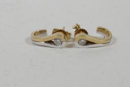 A pair of 18ct yellow gold and diamond earrings