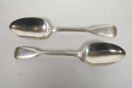 A pair of Victorian silver serving spoons, hallmarked and dated 1842, monogrammed on handle, 9"