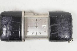 A Movado self winding purse watch, 1¾" long