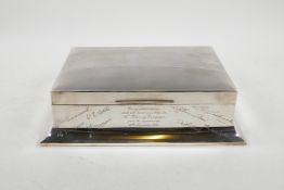 A Walker & Hall hallmarked silver cigar box with an engine turned Art Deco cover and dedications,