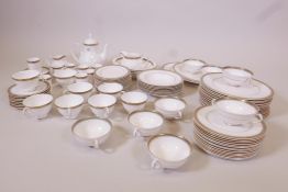 A Royal Doulton 'Clarendon', H.4993 eight place dinner service, lacking one teacup, good