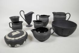 A quantity of Wedgwood black basalt porcelain, including a milk jug 5" high, Jasper decorated