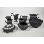 A quantity of Wedgwood black basalt porcelain, including a milk jug 5" high, Jasper decorated