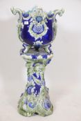 A majolica pedestal and jardiniere, impressed Trentham, 33" high, A/F