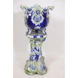 A majolica pedestal and jardiniere, impressed Trentham, 33" high, A/F