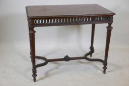 A mahogany centre table, with well carved decoration, pierced frieze and matched veneer top,