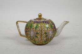 A Chinese cloisonne enamel style gourd shaped teapot, 5" long