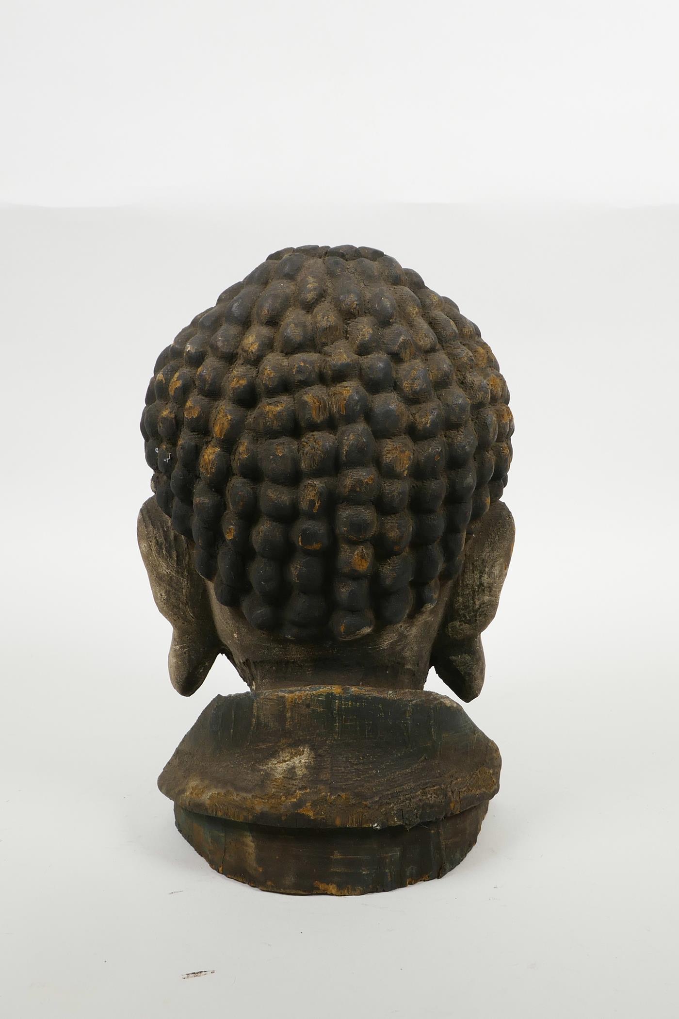An oriental carved and painted Buddha head, 9½" high - Image 3 of 5