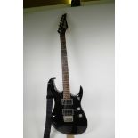 A Washburn Maverick F1-HT electric guitar with black super strat body and rosewood finger board, 40"