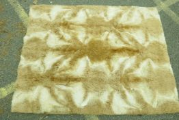 A fur blanket by Maxwell Croft of London, 66" x 51"