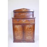 A Victorian mahogany chiffonier with a single drawer and two doors, with later applied stenciled