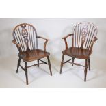 A pair of C19th ash wheel back elbow chairs with elm seats