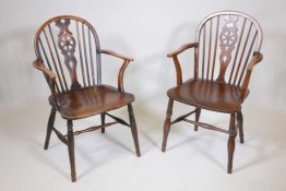 A pair of C19th ash wheel back elbow chairs with elm seats