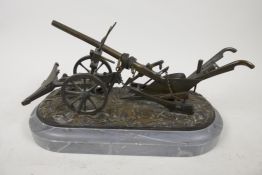 A well made bronze model of a horse drawn plough mounted on a marble plinth, 10½? long
