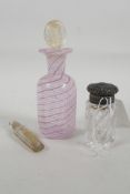 A sterling silver topped glass perfume bottle by John Grinsell & Sons of Birmingham, 2½" high x