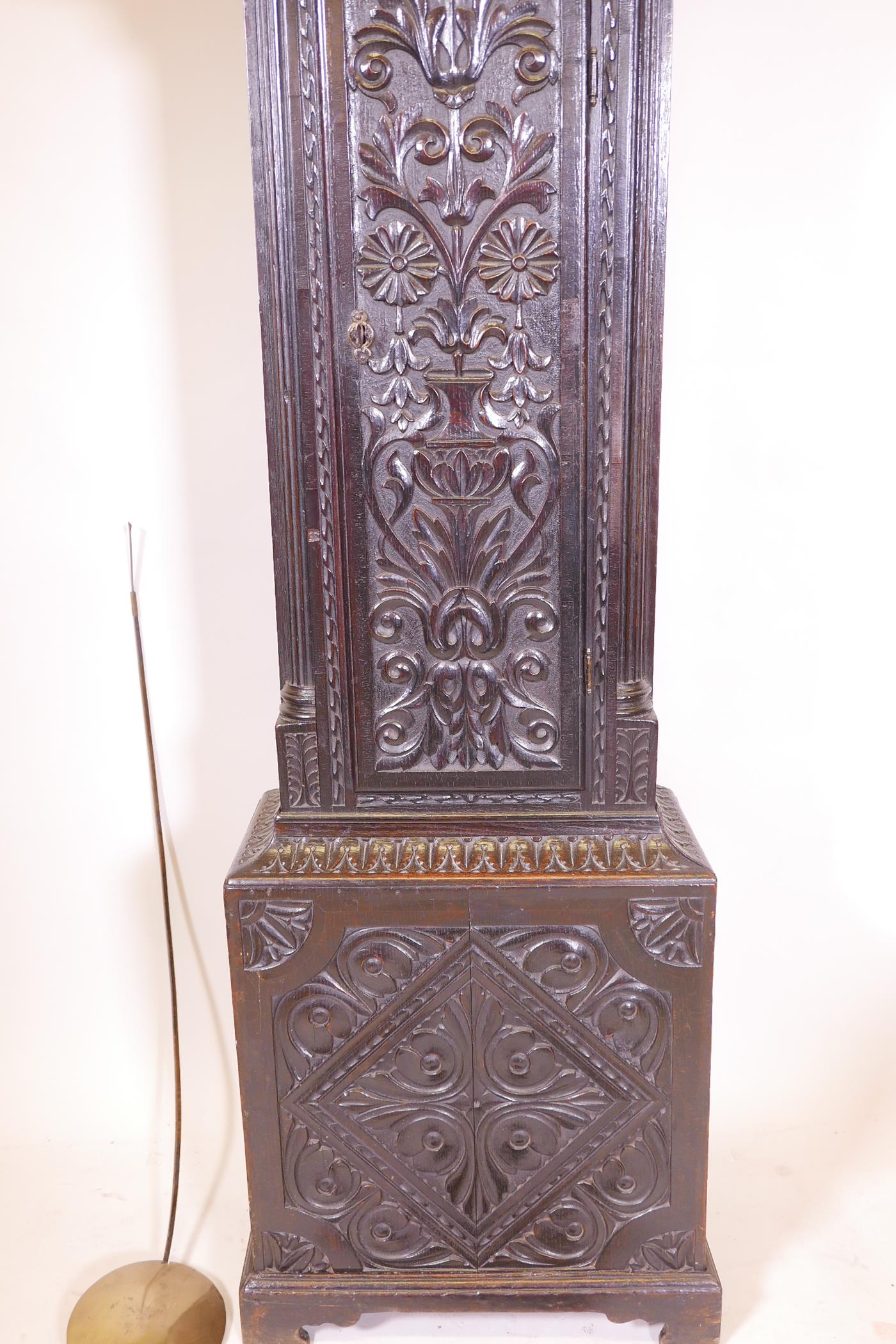An C18th eight day long case clock with carved decoration, the brass dial with gilt spandrels, the - Image 2 of 7