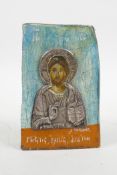A hand painted Orthodox icon with a white metal mount, 3½" x 5½"