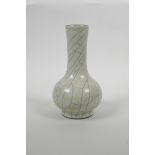 A Chinese crackle glazed pottery bottle vase, 7½" high