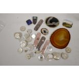 A collection of mother of pearl buttons, mineral samples etc