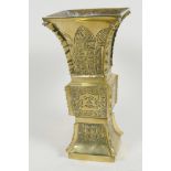 A Chinese bronze square section Gu shaped vase with engraved decoration, 7½" high