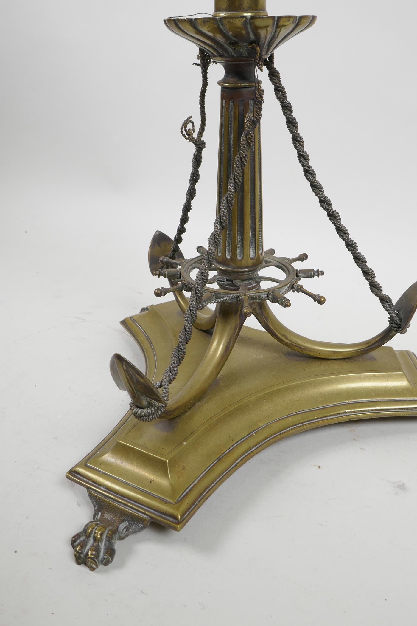 An unusual brass centrepiece on a triform base with nautical decoration, 19½" high, A/F - Image 3 of 5