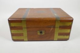 A C19th brass bound mahogany campaign vanity box with a fitted interior, 12½" x 9½"