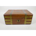 A C19th brass bound mahogany campaign vanity box with a fitted interior, 12½" x 9½"