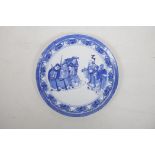 A Chinese blue and white plate with decoration of three figures bearing gifts to a sage, probably