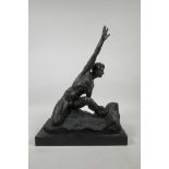 A patinated bronze of an athletic male nude, 11" wide, 14" high