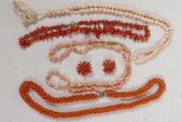 Four various vintage coral necklaces, longest 22", and a pair of coral cluster clip on earrings