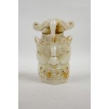 A Chinese reconstituted jade mask ornament, 7"