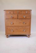 A C19th Dutch pine chest of three drawers over two drawers over two more, with scumble glaze