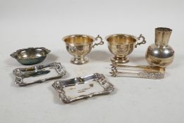 A collection of Swedish silver including two cups marked N.K. (Stockholm 1919), two pin trays marked