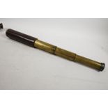 A three draw brass telescope marked 'Britannic' BC & Co made in England, 15" x 6½" closed