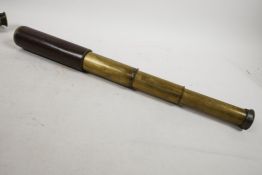 A three draw brass telescope marked 'Britannic' BC & Co made in England, 15" x 6½" closed