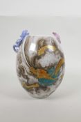 A Chinese polychrome porcelain vase decorated with an iron red and gilt dragon in clouds, and