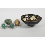 A Chinese Jian Kiln pottery bowl with floral decoration, together with four hardstone decorative