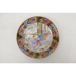 A Cantonese porcelain dish, the gilt border decorated with butterflies, around three women in a