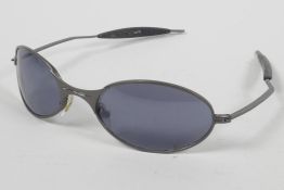 A pair of vintage Oakley sunglasses
