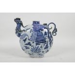 A Chinese blue and white porcelain phoenix pourer, 8" high