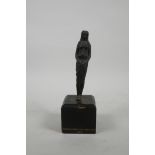 A C19th bronze figure of a classical maiden, on a wood plinth, 7½" high