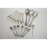 A collection of Swedish silver tea and serving spoons, marked 'E.S.H', 'E.A.N' and 'G.A.B', with