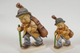 A large Goebel porcelain Hummel figure 'The Little Cellist', 7½" high, together with a smaller