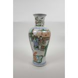 A Chinese famille verte porcelain vase decorated with noblemen in an interior, six character mark to