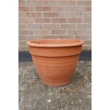 A large French terracotta pot, 15" high x 20½" diameter