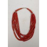 A fire coral multistrand necklace, 21" long