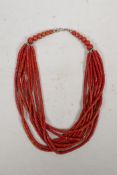 A fire coral multistrand necklace, 21" long