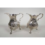 A matching pair of George II silver cream jugs by William Shaw and William Priest, London, c.1759,