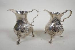 A matching pair of George II silver cream jugs by William Shaw and William Priest, London, c.1759,