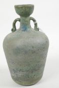 A green studio glass two handled flask/vase with a textured frosted finish, 7½" high